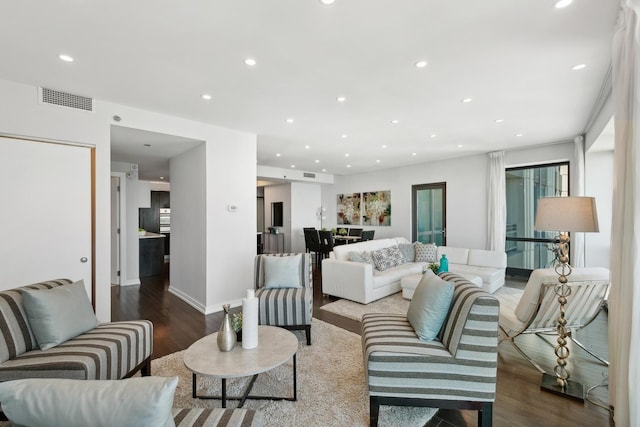 130 N Garland Ct Unit 3803, Chicago, IL 60602 - living area featuring dark wood-type flooring, recessed lighting, and baseboards