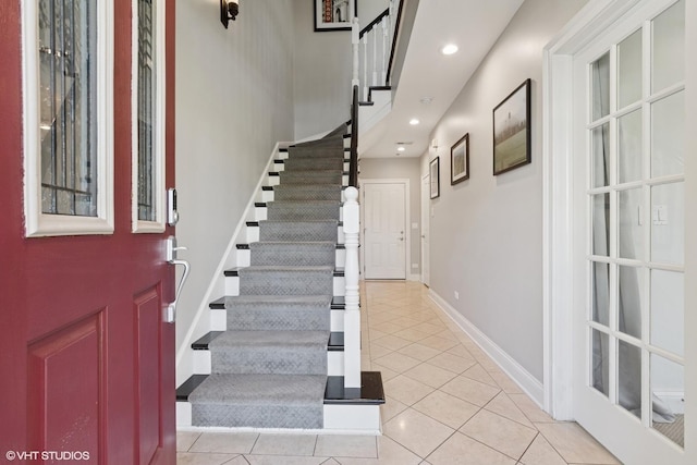 3447 N Whipple St, Chicago, IL 60618 - foyer featuring light tile patterned floors, stairway, recessed lighting, and baseboards