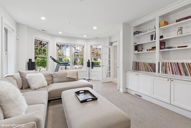 3447 N Whipple St, Chicago, IL 60618 - living room with light colored carpet, recessed lighting, and baseboards