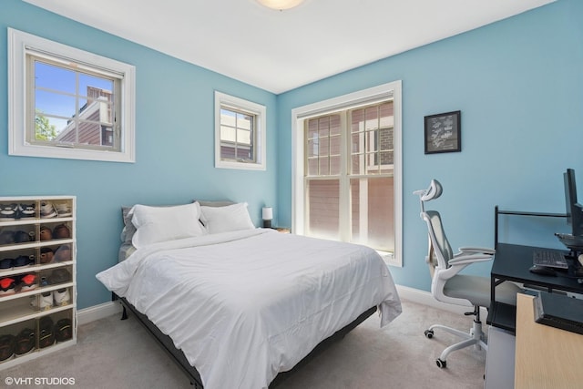 3447 N Whipple St, Chicago, IL 60618 - bedroom with carpet floors, a desk, and baseboards