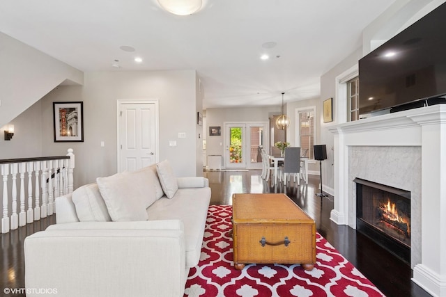 3447 N Whipple St, Chicago, IL 60618 - living area with wood finished floors, recessed lighting, a fireplace, and baseboards