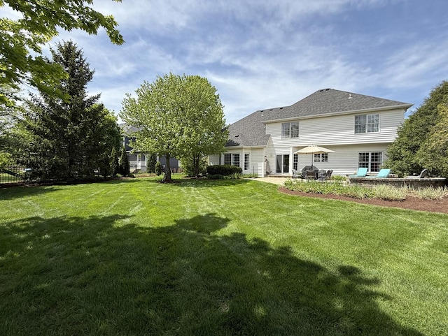 40W095 Carl Sandburg Rd, Saint Charles, IL 60175 - rear view of house with a patio and a yard