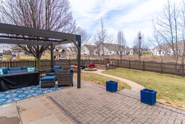 view of patio / terrace featuring an outdoor living space with a fire pit, a pergola, and a residential view