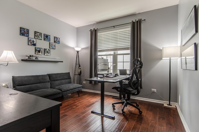 office area with wood-type flooring and baseboards