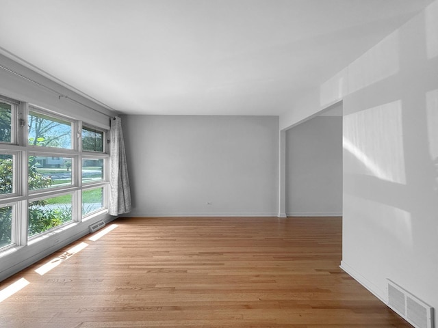 1048 Marshall Dr, Des Plaines, IL 60016 - spare room featuring light wood-style floors and baseboards