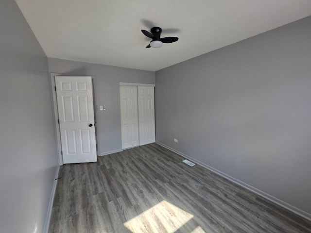20120 Ash Ln Unit 0, Lynwood, IL 60411 - unfurnished bedroom with wood finished floors, baseboards, and a closet