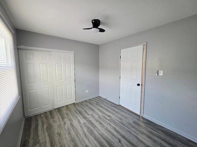 20120 Ash Ln Unit 0, Lynwood, IL 60411 - unfurnished bedroom with wood finished floors, a closet, baseboards, and a ceiling fan