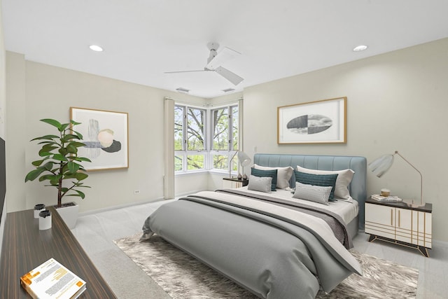 carpeted bedroom with a ceiling fan, recessed lighting, and baseboards