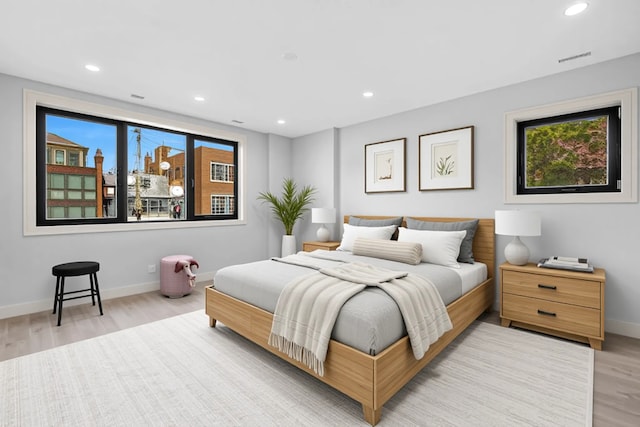 1646 N Orchard St Unit 2, Chicago, IL 60614 - bedroom with light wood-style flooring, multiple windows, baseboards, and recessed lighting