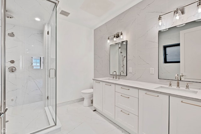 1646 N Orchard St Unit 2, Chicago, IL 60614 - bathroom featuring marble finish floors, a marble finish shower, toilet, and double vanity