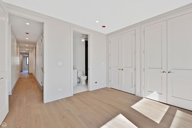 1646 N Orchard St Unit 2, Chicago, IL 60614 - unfurnished bedroom with two closets, light wood finished floors, recessed lighting, ensuite bathroom, and baseboards