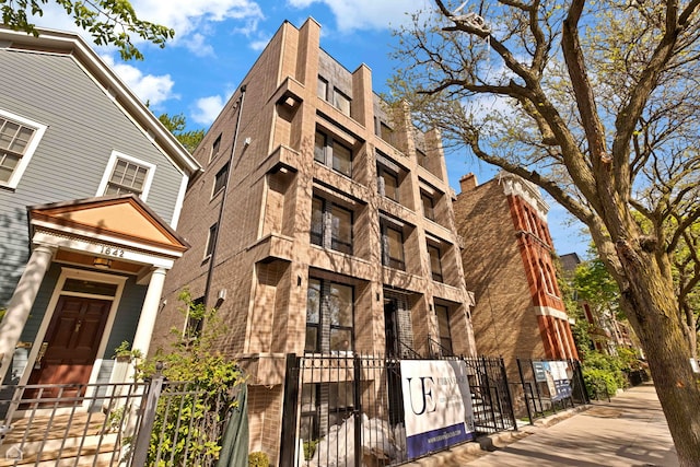1646 N Orchard St Unit 2, Chicago, IL 60614 - view of apartment building / complex featuring a fenced front yard