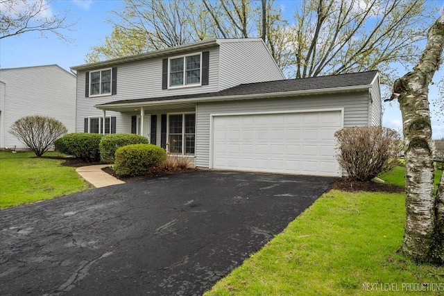 554 Carriage Hill Rd, Naperville, IL 60565 - traditional-style house featuring asphalt driveway, an attached garage, and a front lawn