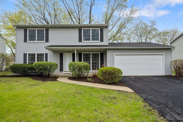 554 Carriage Hill Rd, Naperville, IL 60565 - traditional-style home featuring an attached garage, asphalt driveway, a front lawn, and covered porch