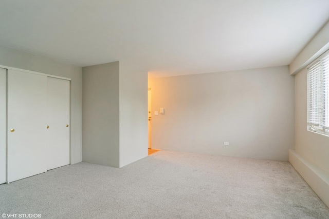 941 N NW Hwy Unit 2B, Park Ridge, IL 60068 - unfurnished bedroom featuring carpet and a closet
