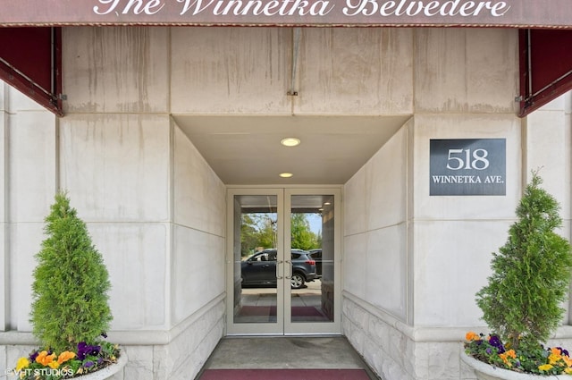 518 Winnetka Ave Unit 203, Winnetka, IL 60093 - view of exterior entry featuring french doors