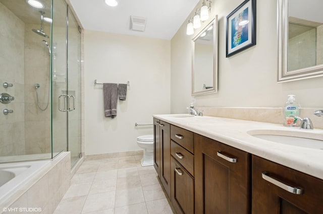 518 Winnetka Ave Unit 203, Winnetka, IL 60093 - full bath with a shower stall, baseboards, tile patterned flooring, toilet, and double vanity