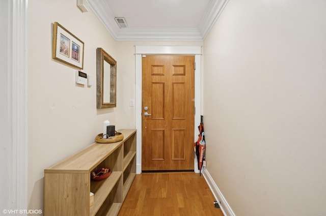 518 Winnetka Ave Unit 203, Winnetka, IL 60093 - doorway featuring light wood finished floors and crown molding