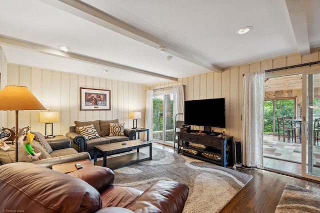 396 Jervey Ln, Bartlett, IL 60103 - living room featuring beam ceiling, wood finished floors, plenty of natural light, and wood walls