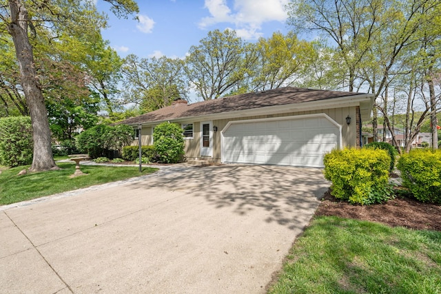 396 Jervey Ln, Bartlett, IL 60103 - view of front of property with a garage, driveway, a chimney, and a front lawn