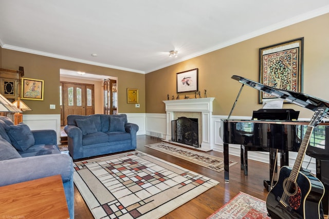 396 Jervey Ln, Bartlett, IL 60103 - living area featuring crown molding, wood finished floors, a high end fireplace, and wainscoting