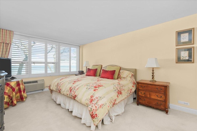 1630 Sheridan Rd Unit 1K, Wilmette, IL 60091 - bedroom featuring carpet flooring, a wall unit AC, and baseboards
