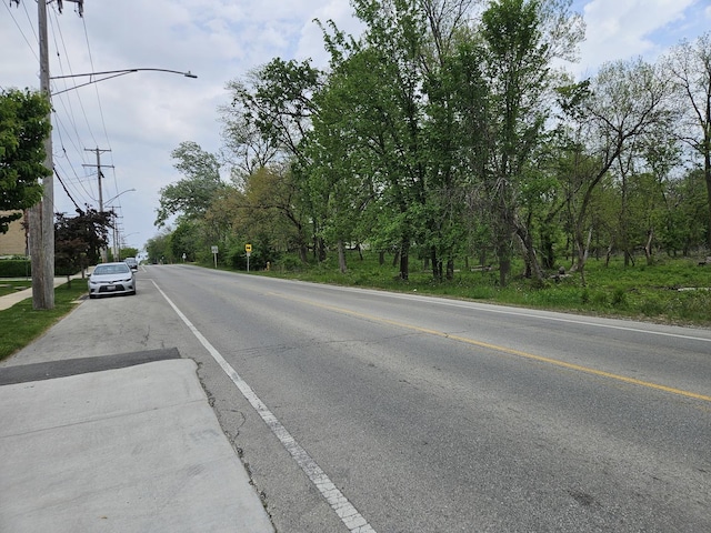 6710 W Harts Rd, Niles, IL 60714 - view of asphalt road with street lights
