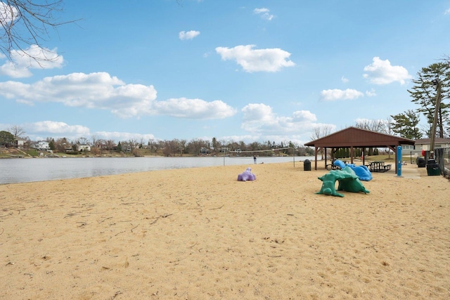 surrounding community featuring a gazebo and a water view