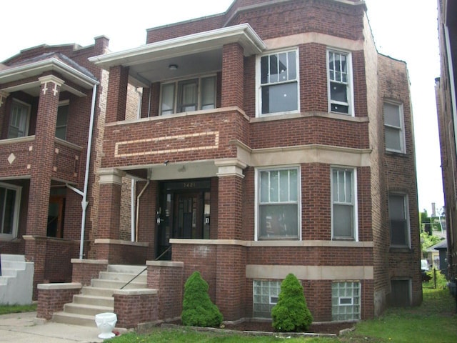 7421 S Eberhart Ave, Chicago, IL 60619 - view of front of house with brick siding