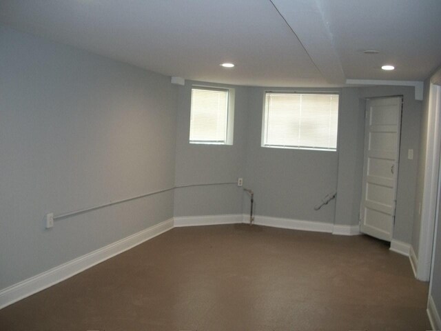 7421 S Eberhart Ave, Chicago, IL 60619 - below grade area with dark carpet, recessed lighting, and baseboards