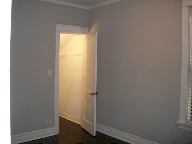 7421 S Eberhart Ave, Chicago, IL 60619 - empty room featuring ornamental molding, baseboards, and dark wood-style floors