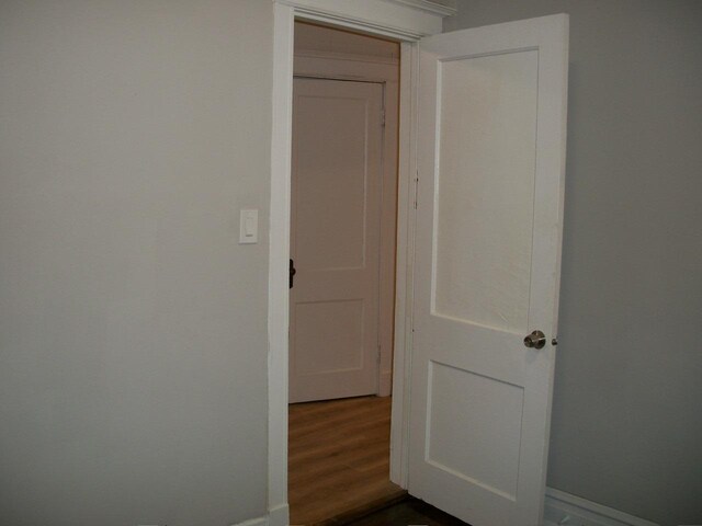 7421 S Eberhart Ave, Chicago, IL 60619 - hallway with dark wood-type flooring and baseboards