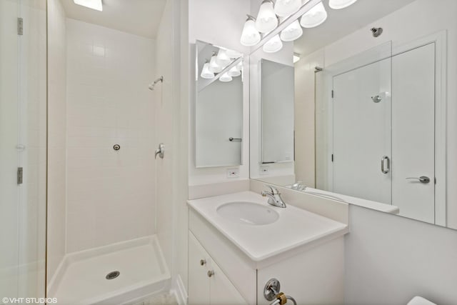 33 W Ontario St Unit 25H, Chicago, IL 60654 - bathroom with a shower stall and vanity