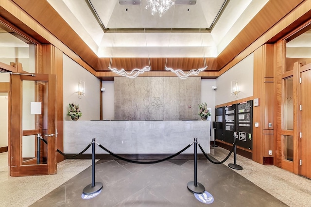 33 W Ontario St Unit 25H, Chicago, IL 60654 - reception area featuring a chandelier