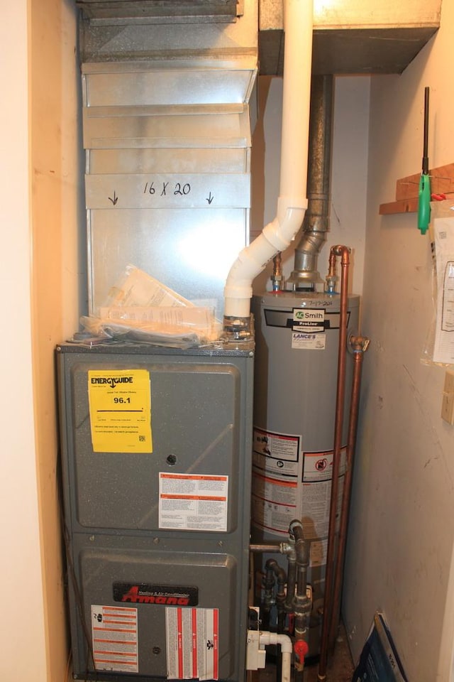 utility room featuring gas water heater