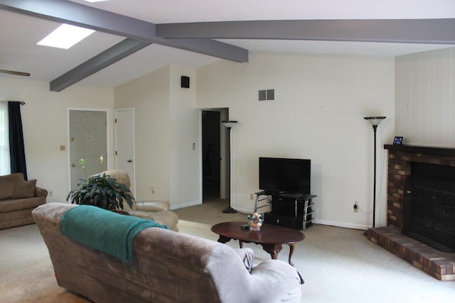 carpeted living room with a fireplace and baseboards