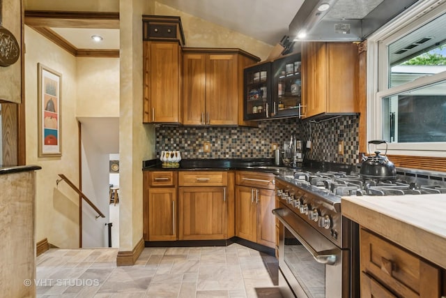 90 Golfview Rd, Lake Zurich, IL 60047 - kitchen with gas range, brown cabinets, tasteful backsplash, and crown molding
