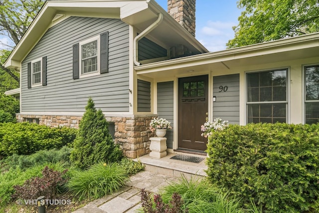 90 Golfview Rd, Lake Zurich, IL 60047 - doorway to property with a chimney and stone siding