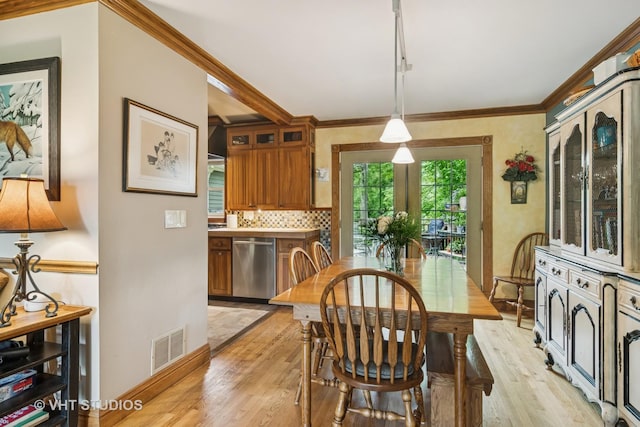 90 Golfview Rd, Lake Zurich, IL 60047 - dining room with light wood finished floors and crown molding