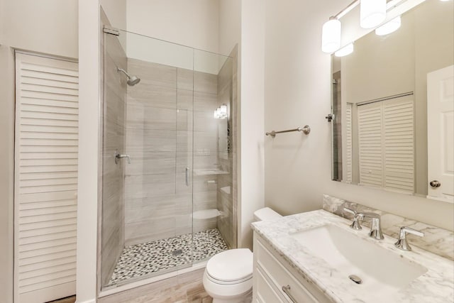 2136 W Evergreen Ave Unit 3B, Chicago, IL 60622 - bathroom with toilet, a shower stall, vanity, and a closet