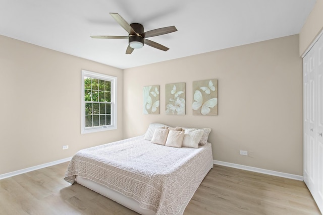 10S241 Wallace Dr, Downers Grove, IL 60516 - bedroom with a closet, light wood-style flooring, and baseboards