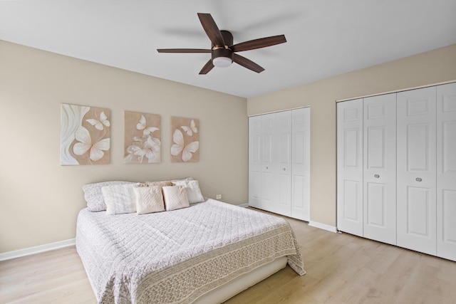 10S241 Wallace Dr, Downers Grove, IL 60516 - bedroom featuring multiple closets, light wood-type flooring, and baseboards