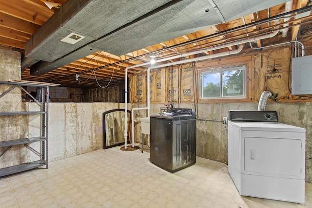 10S241 Wallace Dr, Downers Grove, IL 60516 - below grade area with electric panel, washer and dryer, and tile patterned floors
