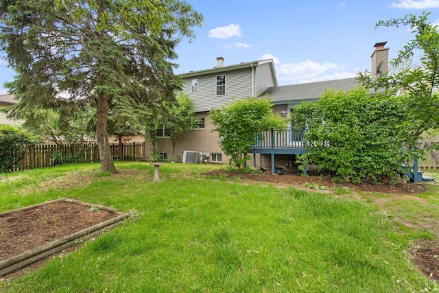 10S241 Wallace Dr, Downers Grove, IL 60516 - view of yard featuring central AC unit and a deck