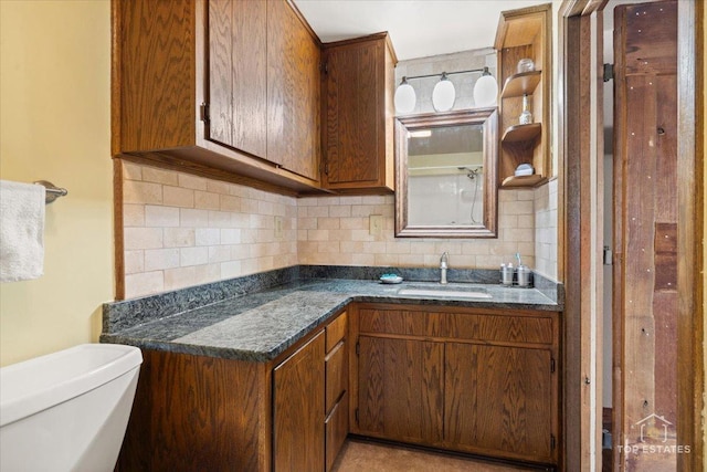 206 Walnut St, Cherry Valley, IL 61016 - bathroom featuring vanity, toilet, and decorative backsplash