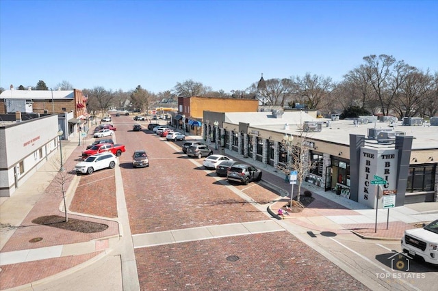 206 Walnut St, Cherry Valley, IL 61016 - view of street with sidewalks, curbs, and street lights