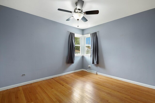 17708 Walter St, Lansing, IL 60438 - unfurnished room with light wood-type flooring, baseboards, and a ceiling fan