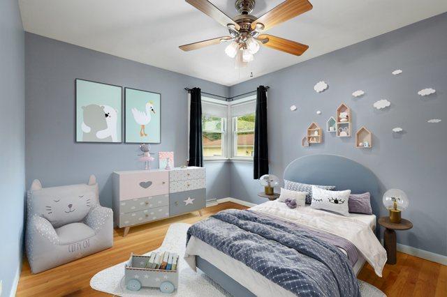 17708 Walter St, Lansing, IL 60438 - bedroom with baseboards, wood finished floors, and a ceiling fan