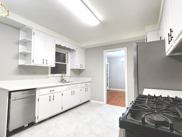 5049 Birchwood Ave, Skokie, IL 60077 - kitchen with stainless steel appliances, a sink, open shelves, light countertops, and white cabinets