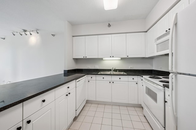 512 N Mcclurg Ct Unit 902, Chicago, IL 60611 - kitchen with white appliances, a sink, white cabinetry, and light tile patterned floors